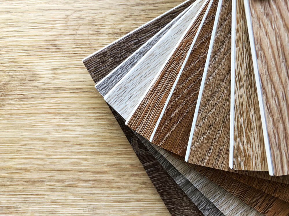 Luxury vinyl flooring sample wood planks.