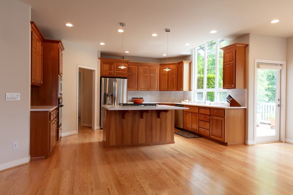 Remodelled kitchen with real red oak hardwood floors.